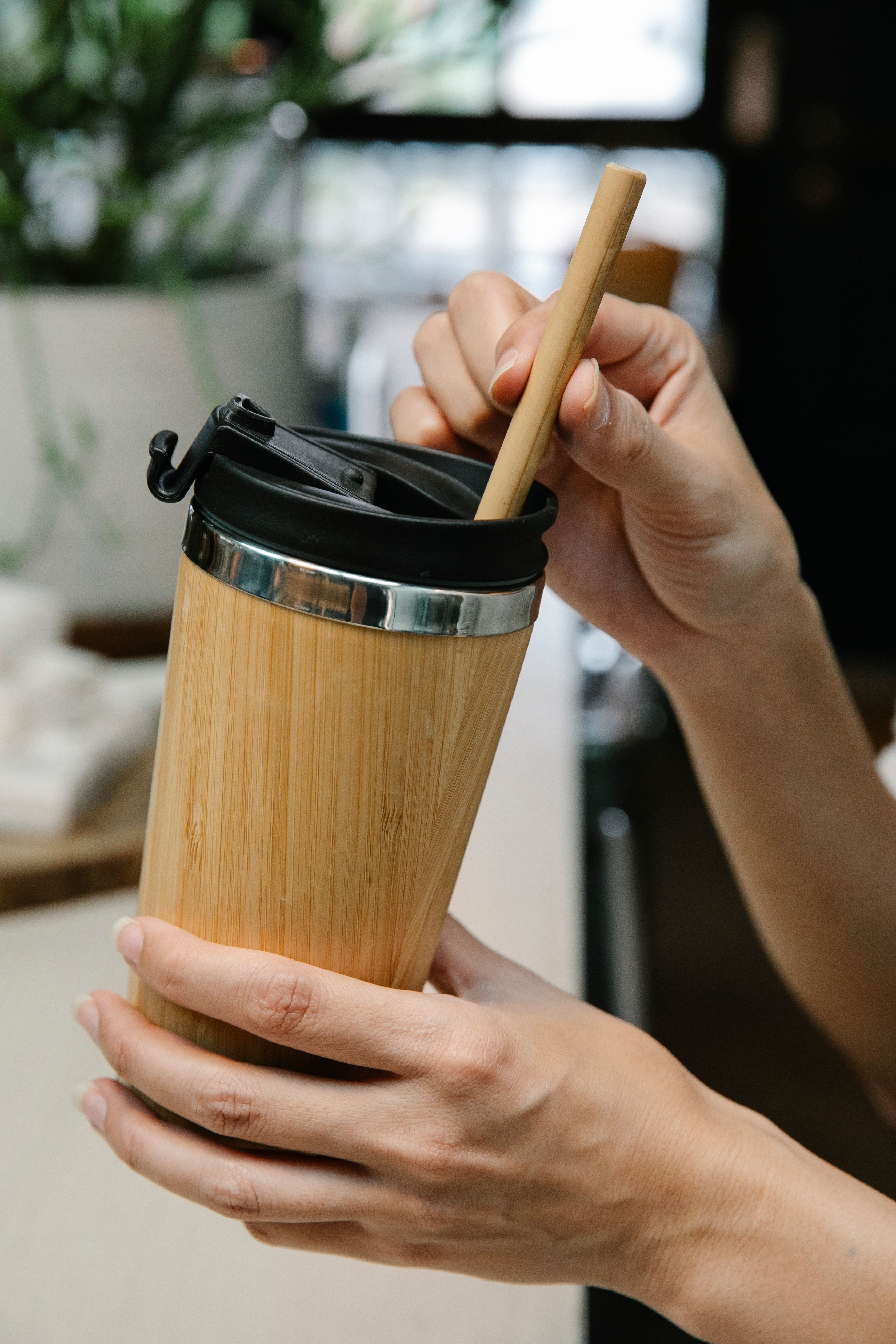 Sample stock photo of a bamboo tumbler with lid and straw